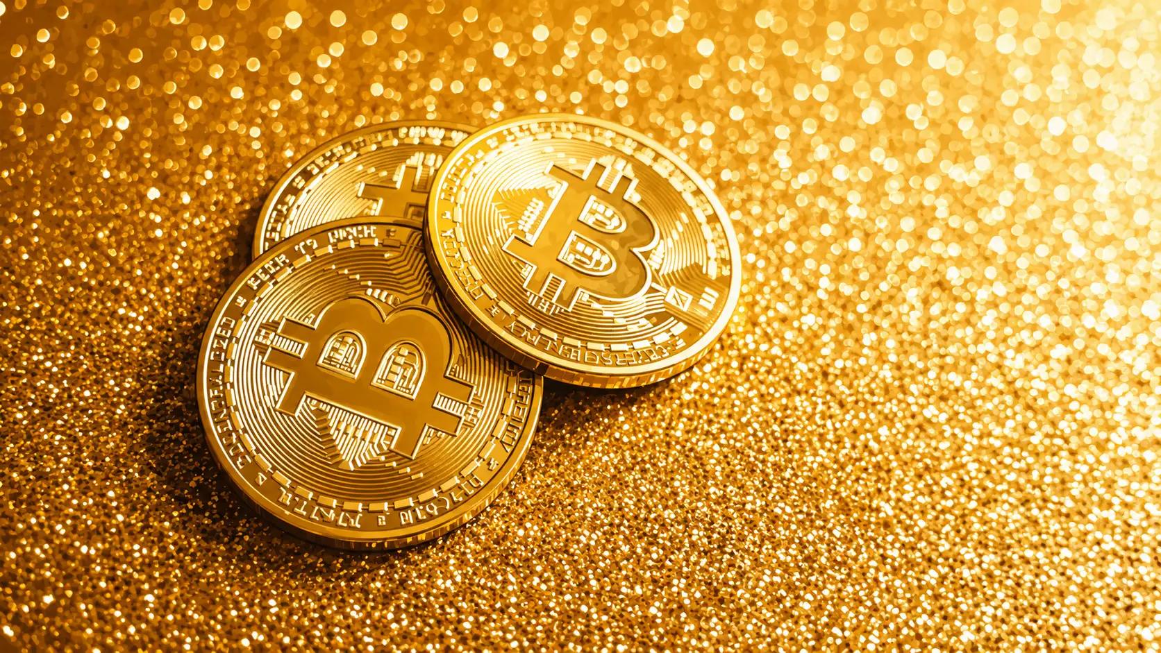 Golden Bitcoin stack with sparkle bokeh